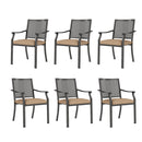 Set of six outdoor chairs with woven backrests and beige cushions on a white background