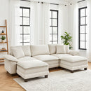 5-Seater beige sectional sofa with ottoman in a living room with large windows and white curtains.