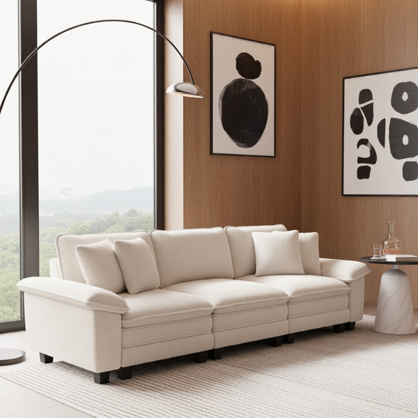 Beige sofa in a modern living room with abstract art on the wall.