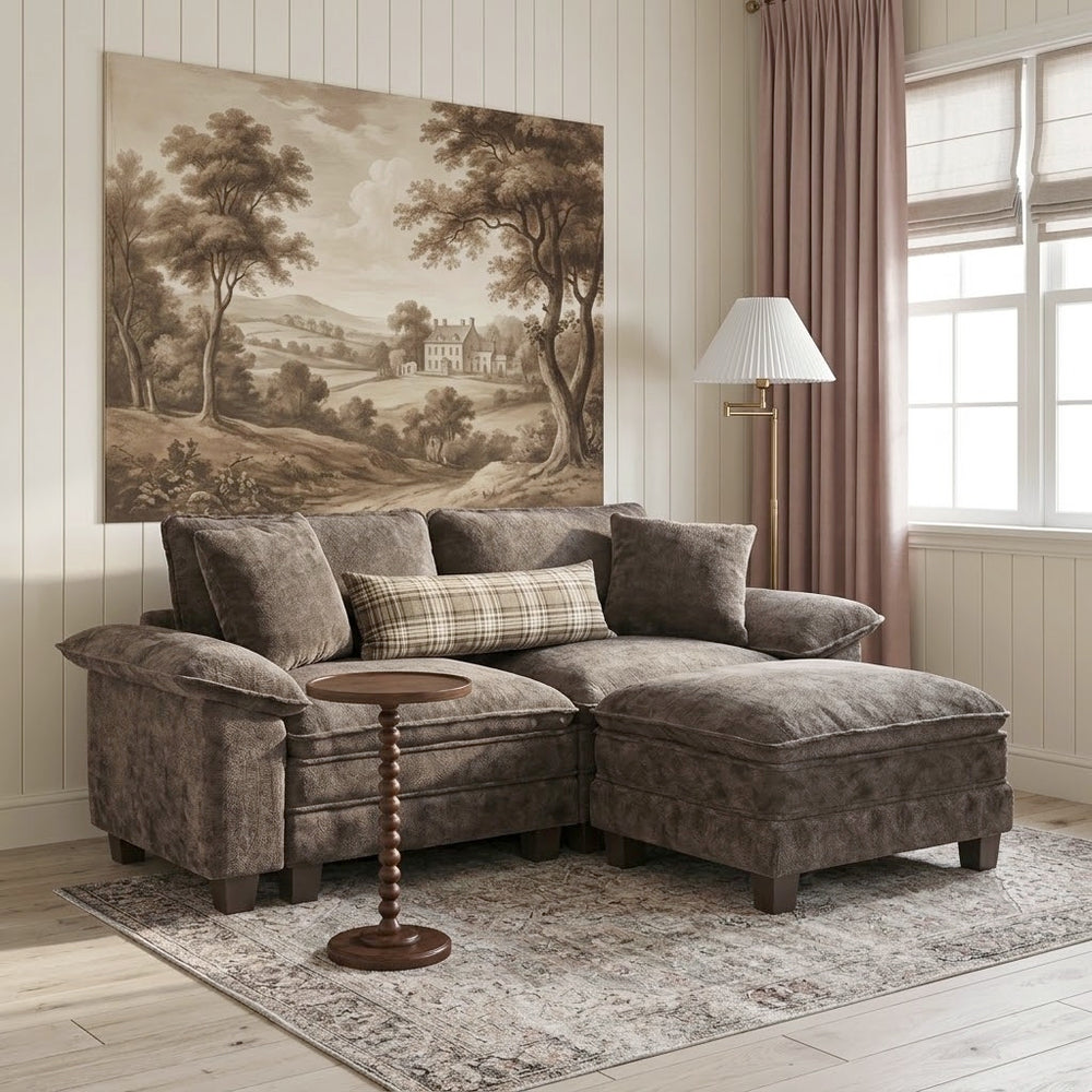 A dark sectional sofa in a cozy living room