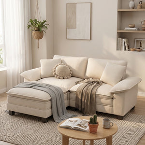 A cream-colored sofa for small living rooms. The sofa is styled with several throw pillows in the same color as the sofa.