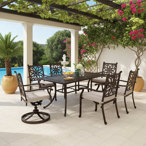 cast aluminum dining set with table and 6chairs under a pergola with plants and flowers.