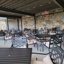 commercial tables, chairs in a half-outdoor space