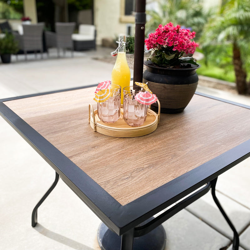 ceramic patio table with umbrella hole 37" Bistro Steel Slat The use of aluminum makes it significantly lighter than traditional iron tables Ceramic Black Patio Set With